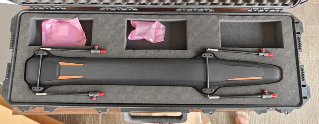 Magnetometer in its protective field case; enclosure appearance adapted with AI